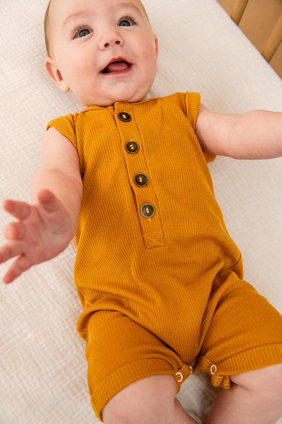 SLEEVELESS PLAYSUIT - MUSTARD