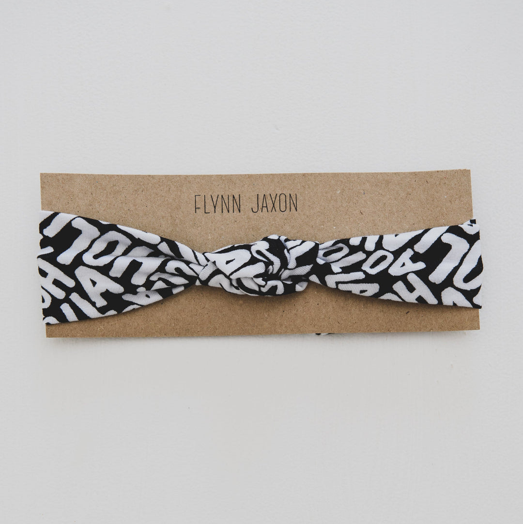 HEADBAND - HOLLA (Black + White Text) - Flynn Jaxon