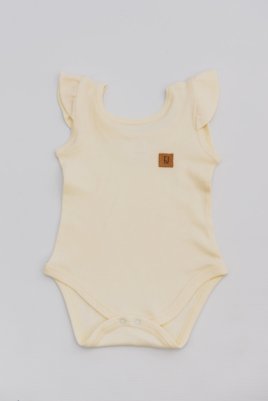 BABY VEST - CREAM FRILLED - Flynn Jaxon